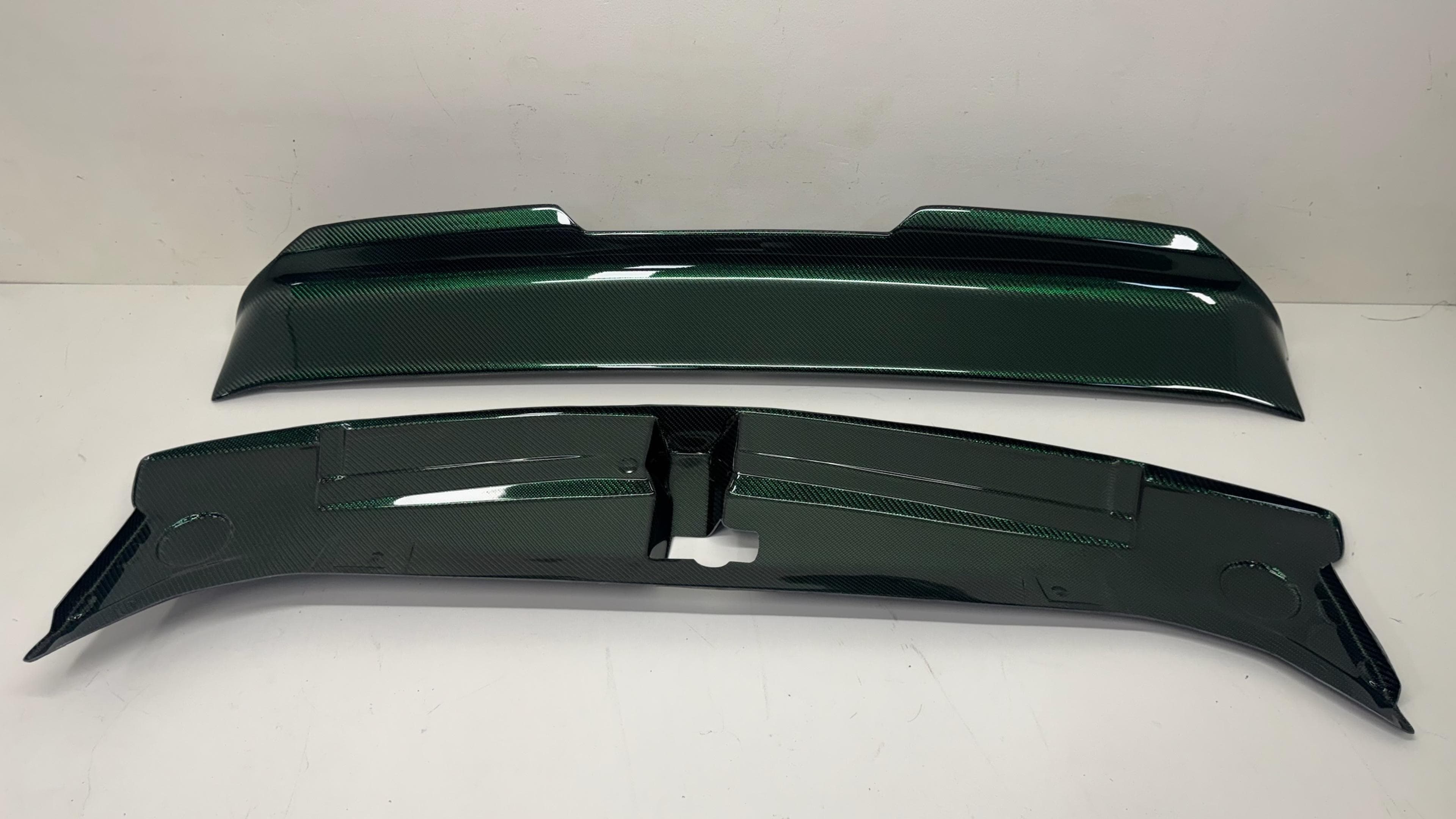 Green reflective carbon fiber spoiler and radiator trim set 2016-2023 Dodge Challenger green reflective carbon fiber spoiler and radiator trim set.