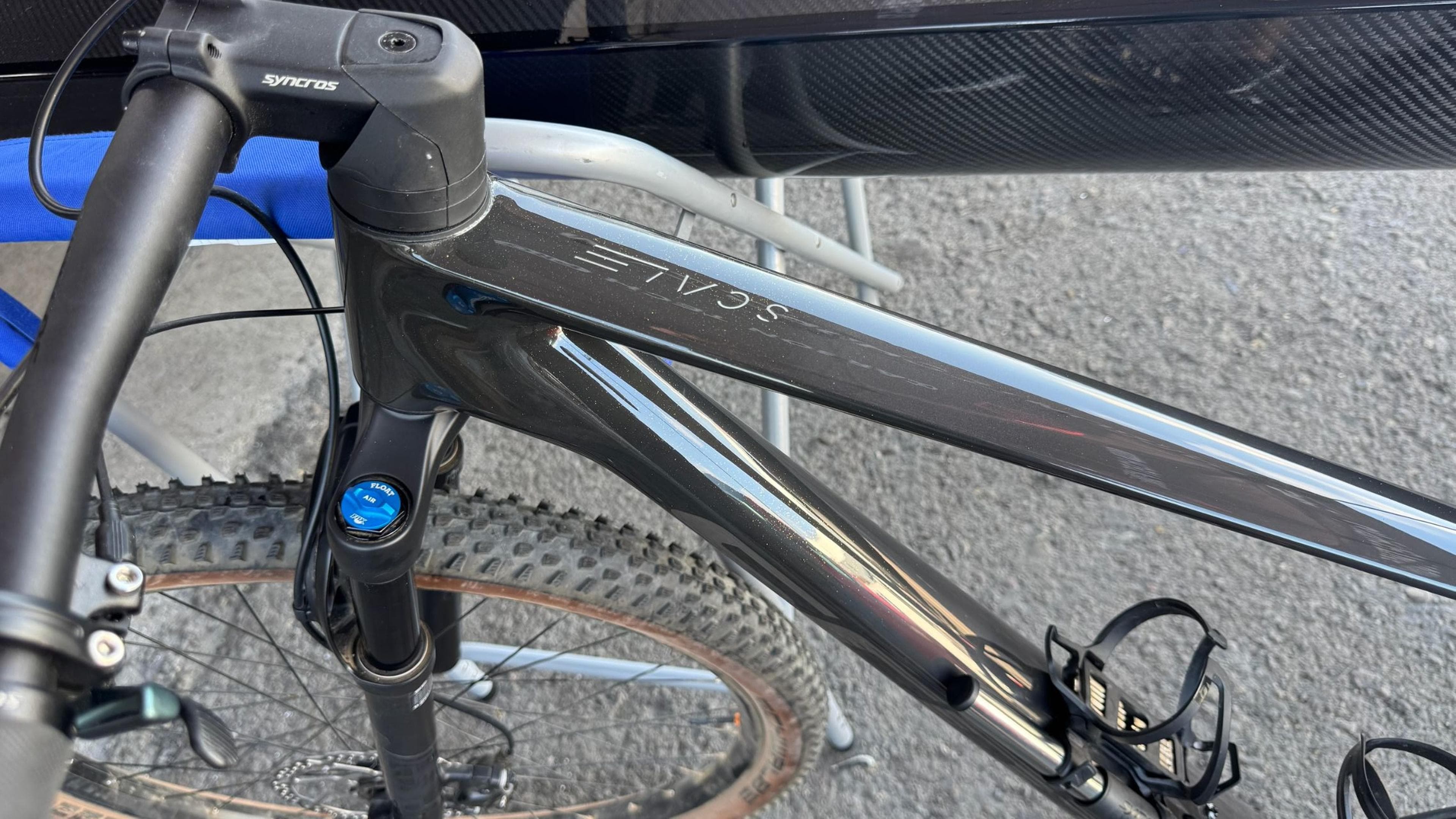 Front section of the Scott Scale RC frame after carbon fiber repair and refinishing. Repaired Scott Scale RC carbon fiber mountain bike frame near the head tube and top tube