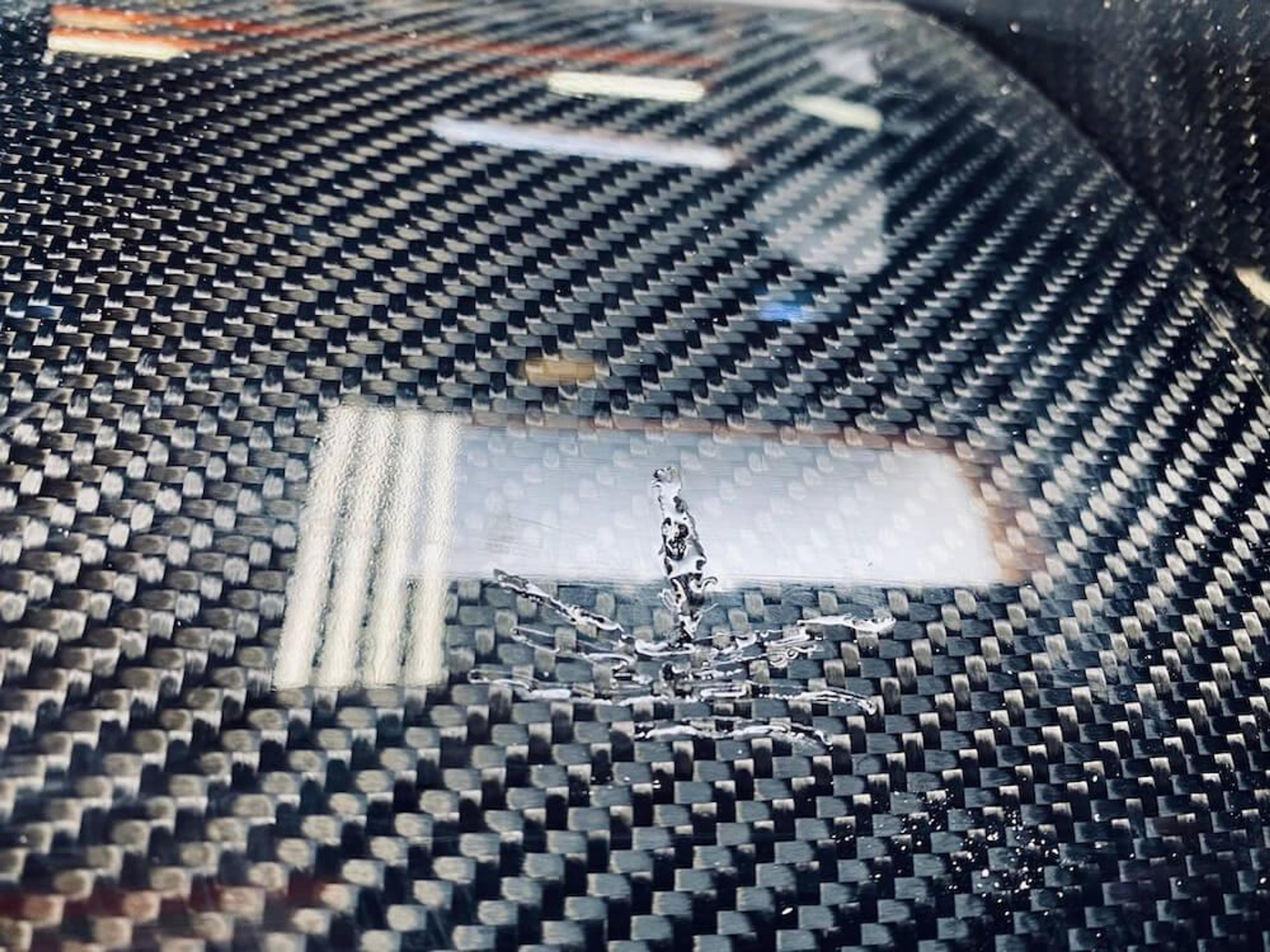Damaged Carbon Fiber Surface Audi Diffuser Repair