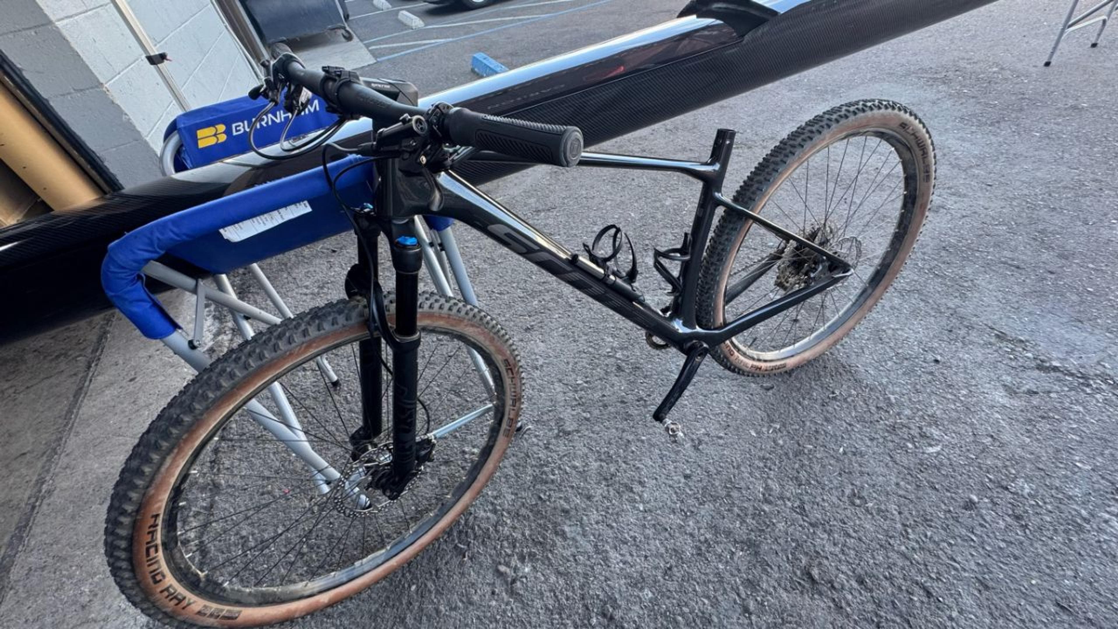 Front three-quarter view showing the repaired frame integrated with the bike’s original components. Front three-quarter view of repaired Scott Scale RC carbon fiber mountain bike